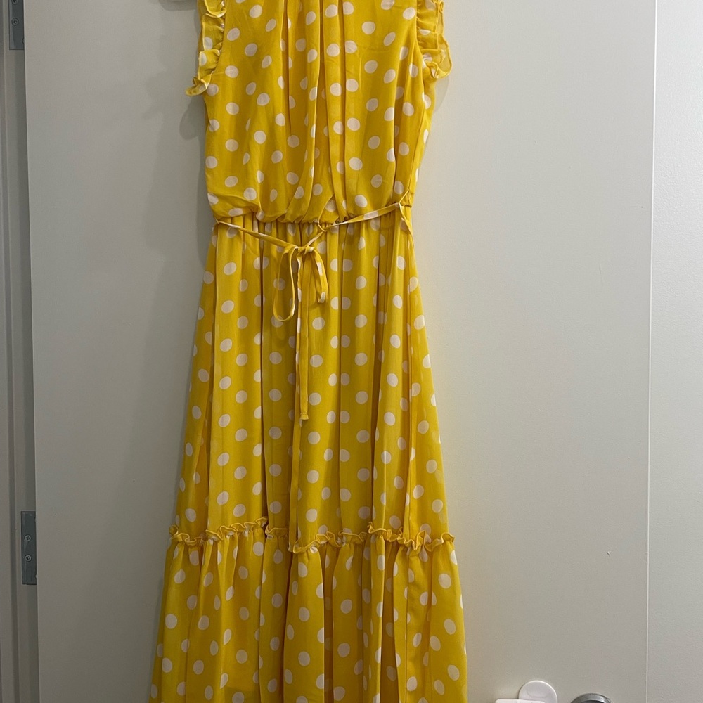 Cheerful and feminine Yellow and white polka dot ruffled dress